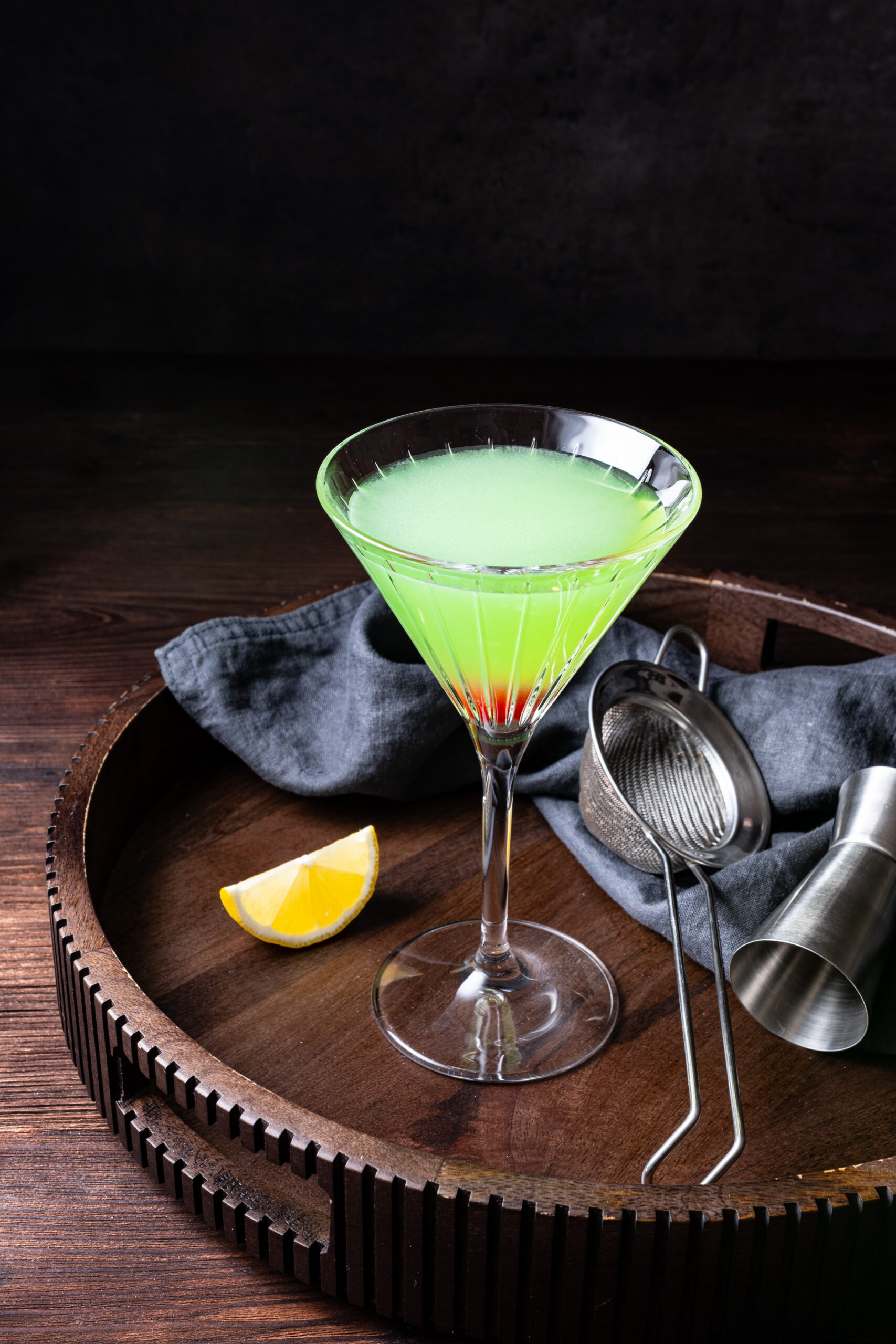 Japanese Slipper Cocktail in a glass diagonal shot