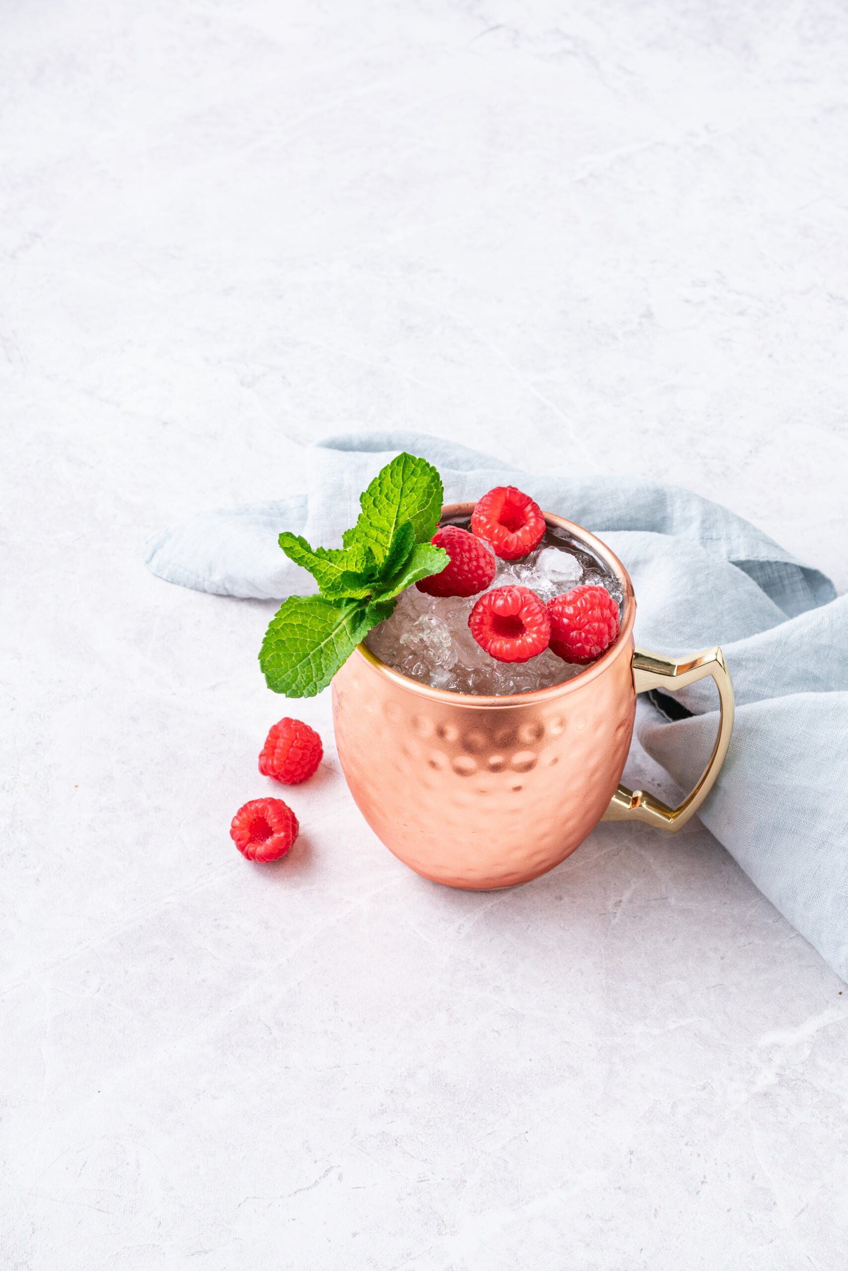 Raspberry Moscow Mule in a copper mug shot from above