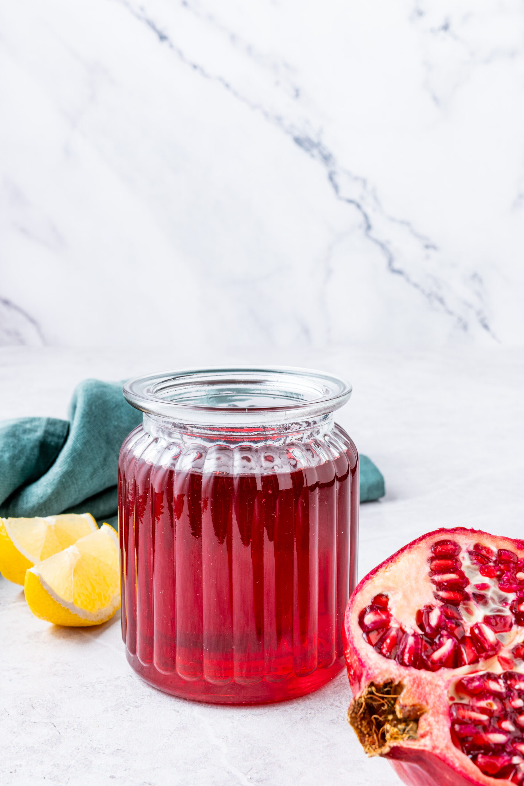 Grenadine Syrup Recipe in a bottle close-up side shot