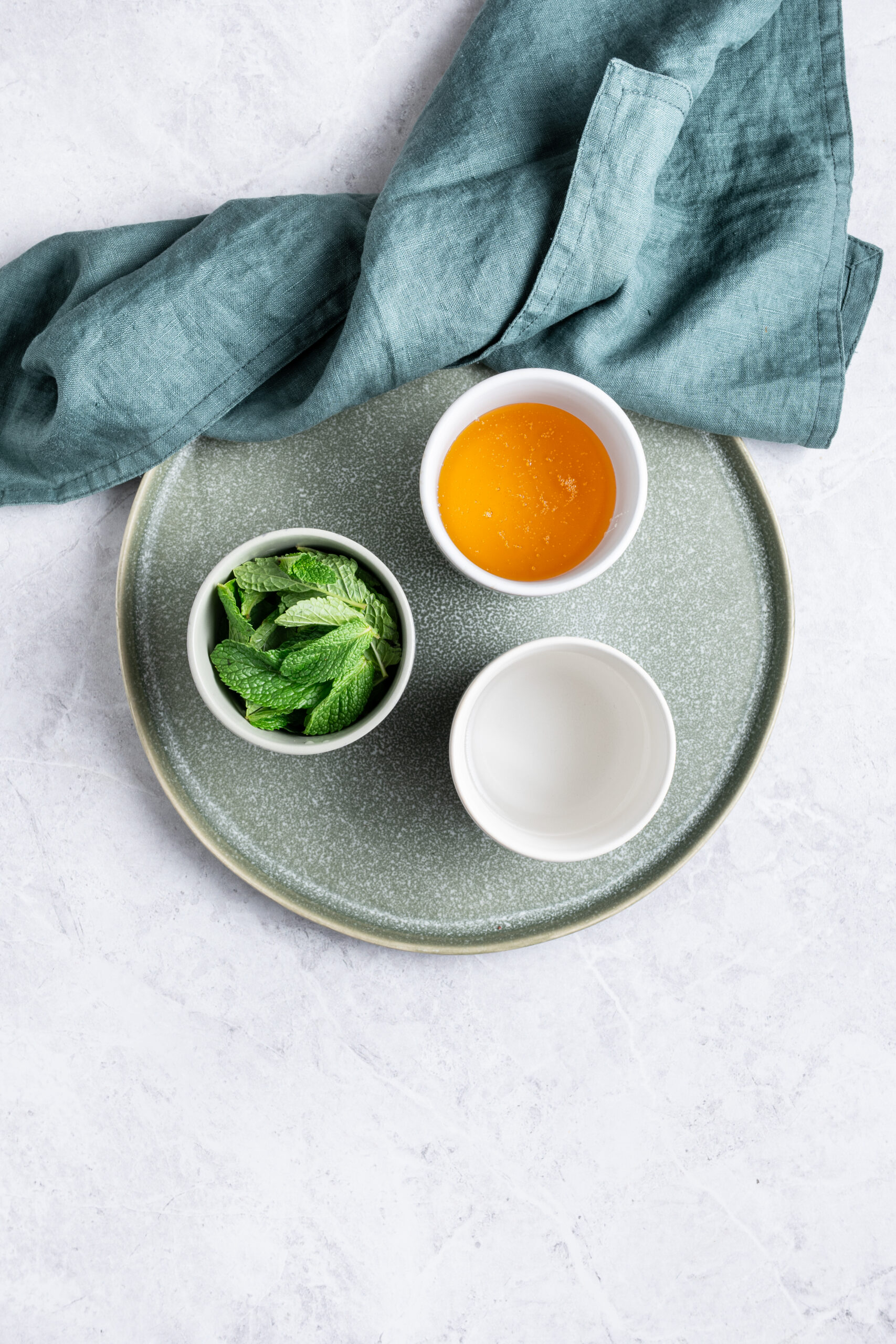 Mint Simple Syrup ingredients on a tray shot from above